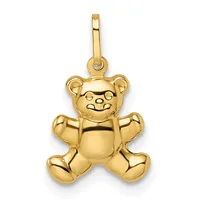 A polished gold teddy bear pendant with a smiling face and bow tie, suspended from a gold bail loop.