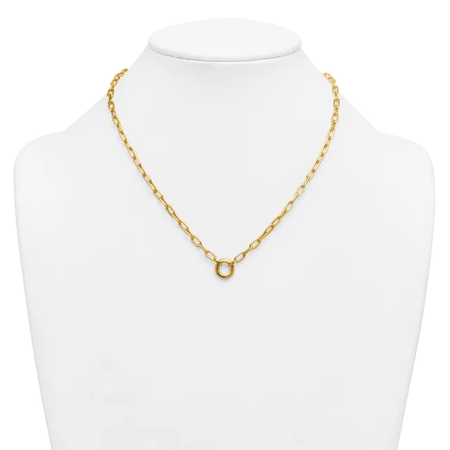 A gold-toned chain necklace with oval link sections displayed on a white mannequin bust, featuring a small circular pendant at the center front.