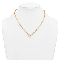 A gold-toned chain necklace with oval link sections displayed on a white mannequin bust, featuring a small circular pendant at the center front.