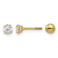 Two gold stud earrings displayed separately: one with a round clear stone in a four-prong setting, and one polished gold ball, both with screw-back posts.