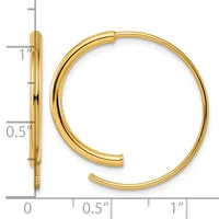 Gold-toned hoop earrings shown from front and side view with a ruler indicating dimensions of approximately 1 inch diameter and 0.5 inch tube width.