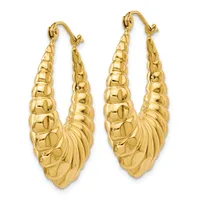 A pair of gold hoop earrings with textured ridged and shell-like surface patterns, shown from the front against a white background.