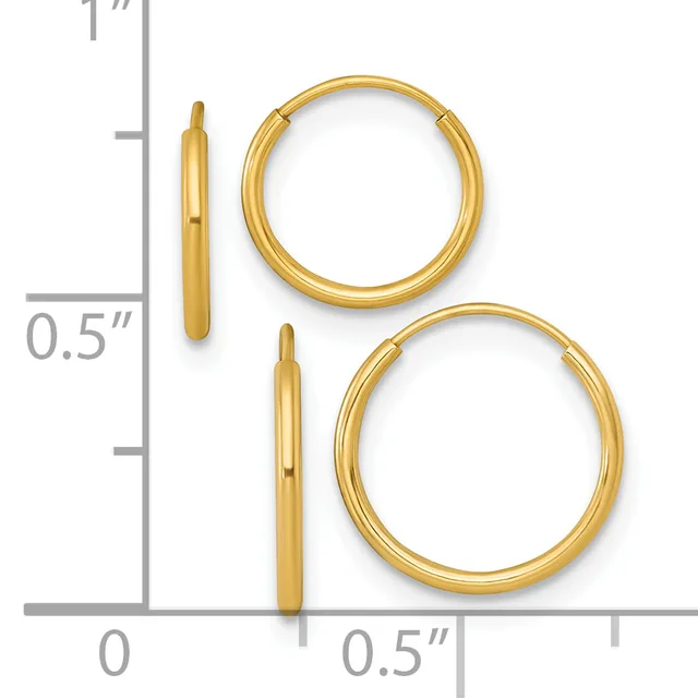 Two pairs of gold hoop earrings displayed next to a ruler showing measurements, with smaller hoops at top and larger hoops at bottom.