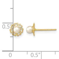 Pair of gold stud earrings featuring cream pearls surrounded by heart-shaped gold filigree, shown with a measurement scale indicating approximately half-inch diameter.