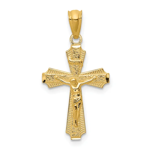 A gold crucifix pendant with detailed texturing on the arms and corpus, shown hanging from a bale against a white background.