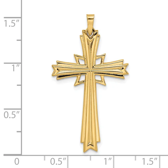 Gold-toned cross pendant with ornate details and vertical ridging, displayed against a measurement scale showing approximately 1.5 inches in height.