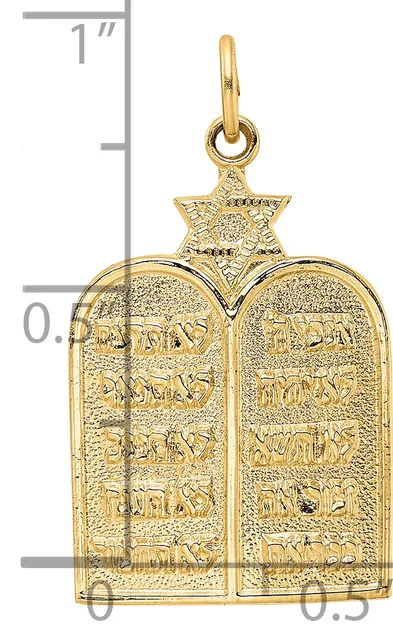 Gold pendant featuring two rectangular tablets with Hebrew text topped by a small star, shown against a measurement scale.