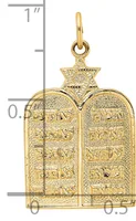 Gold pendant featuring two rectangular tablets with Hebrew text topped by a small star, shown against a measurement scale.