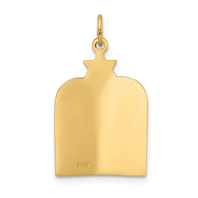 A polished gold pendant in the shape of a rounded rectangular plaque with a decorative pointed top, featuring a small stamped hallmark on the lower surface.