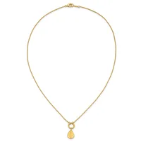 A gold chain necklace with a small circular clasp at the top and a teardrop-shaped pendant hanging from the bottom.