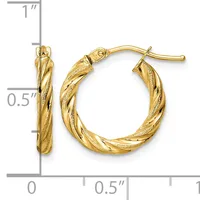 Gold twisted hoop earrings with textured finish, approximately 0.5 inches in diameter, shown with measurement scale.