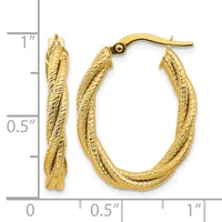 A pair of gold twisted hoop earrings with textured surfaces, shown next to a measurement ruler indicating approximately one inch in length.