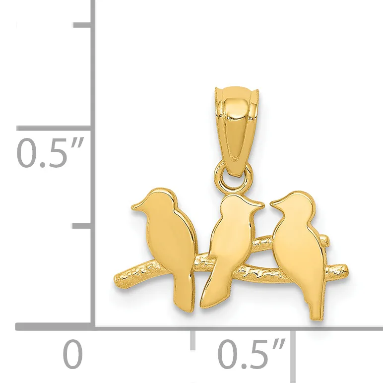 Gold pendant featuring three birds perched on a branch, shown next to a ruler indicating approximately half an inch in height.