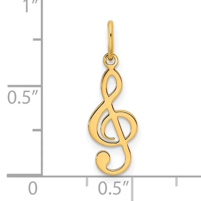 Gold treble clef musical note pendant with a small loop at top for attachment, shown next to a ruler indicating approximately one inch in length.