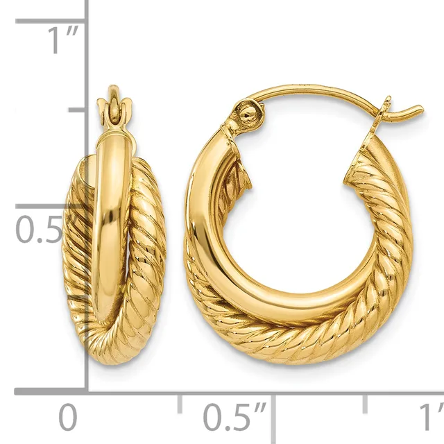 A pair of gold hoop earrings with twisted textured sides and polished centers, shown next to a ruler indicating approximately one inch in length.