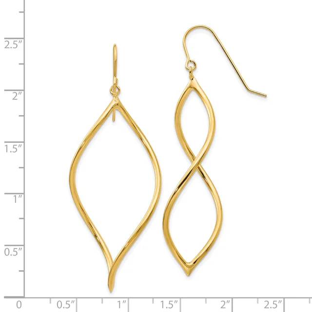 Gold-toned drop earrings with elongated leaf-shaped outlines, displayed next to a measurement ruler showing they extend approximately 2.5 inches in length.