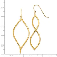 Gold-toned drop earrings with elongated leaf-shaped outlines, displayed next to a measurement ruler showing they extend approximately 2.5 inches in length.
