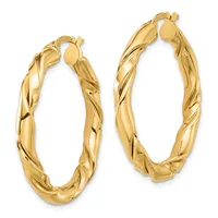 A pair of twisted gold hoop earrings with hinged closures, shown in two sizes side by side against a white background.
