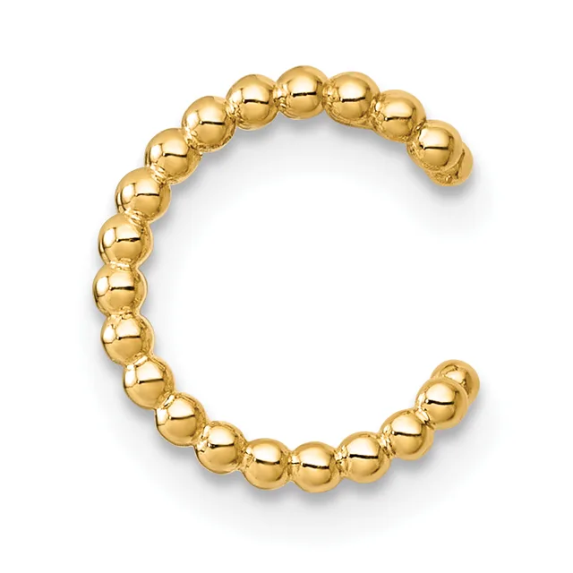 A polished gold-colored beaded bracelet made of uniformly sized spherical beads arranged in a continuous circle against a white background.