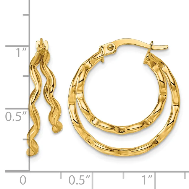 Pair of gold twisted hoop earrings with textured surfaces, shown next to a ruler measuring approximately one inch in diameter.