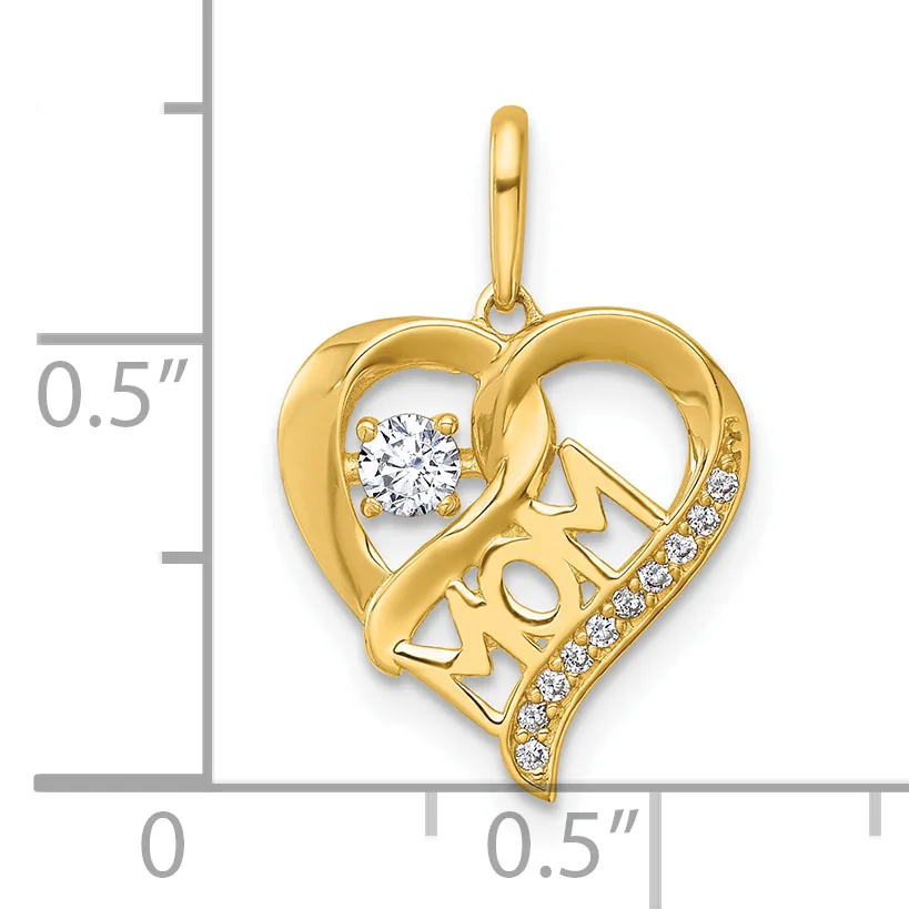 Gold heart-shaped pendant with cutout "MOM" text, a round diamond at top left, and small diamonds along the bottom curve, shown next to a ruler.