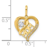 Gold heart-shaped pendant with cutout "MOM" text, a round diamond at top left, and small diamonds along the bottom curve, shown next to a ruler.
