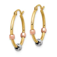 A pair of gold hoop earrings with rose gold and silver beaded accents, displayed against a white background.