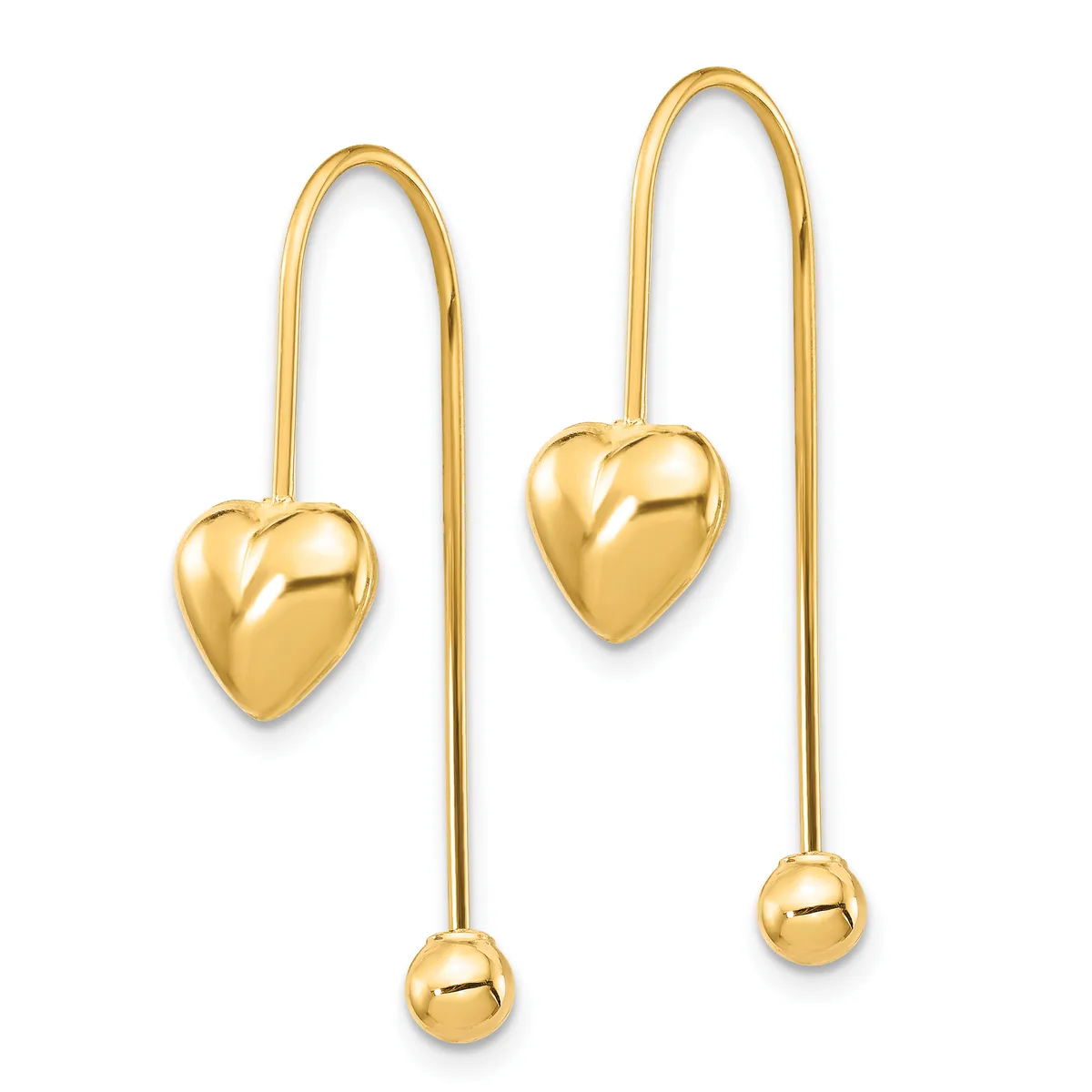 Pair of gold threader earrings featuring polished heart charms on the left earring and a small spherical bead on the right earring, suspended from long curved wires.