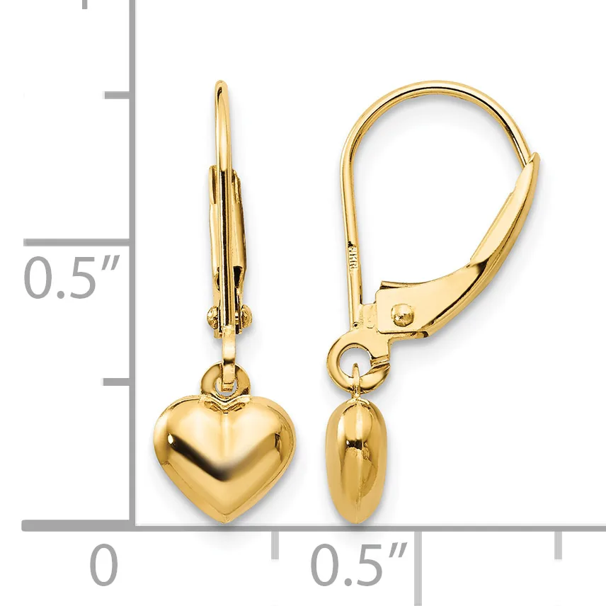 Pair of gold-colored heart-shaped dangle earrings with lever-back closures, shown next to a measurement scale indicating approximately half-inch length.