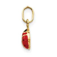 A gold-toned keychain with an oval loop at the top, displaying a red and black enamel ladybug charm hanging below.