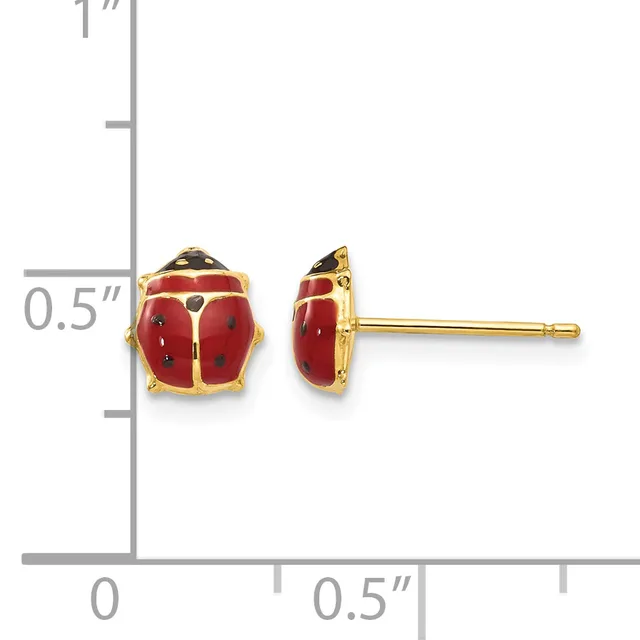 Pair of red enamel ladybug stud earrings with gold-tone metal settings and posts, shown front and side view against a measurement scale.