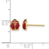 Pair of red enamel ladybug stud earrings with gold-tone metal settings and posts, shown front and side view against a measurement scale.