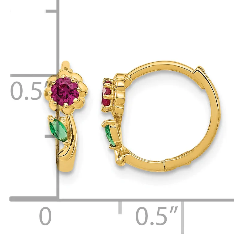 Gold hoop earrings with pink tourmaline flower tops and green tourmaline accents, shown with a measurement scale.