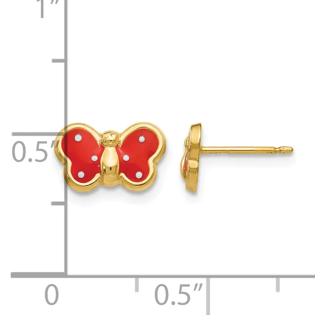 Gold-toned stud earrings featuring red enamel butterfly charms with white polka dots, shown front and side view against a measurement scale.
