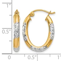 Pair of two-tone gold oval hoop earrings with textured white gold lower halves and polished yellow gold upper halves, shown with a measurement scale.