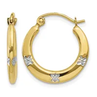 Pair of gold hoop earrings with white gold star accents, shown from front and side views.