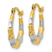 A pair of two-tone gold hoop earrings with textured segmented design, featuring alternating yellow and white gold sections with a small hallmark visible.