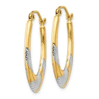 A pair of gold hoop earrings with textured white gold sections at the bottom, displayed against a white background.