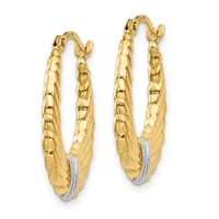 A pair of gold hoop earrings with textured surfaces and white gold accents along the inner curves, shown from the front against a white background.