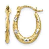 A pair of gold hoop earrings with textured surfaces and white gold accents, displayed front and side views with a hinged post back closure.
