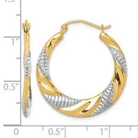 Two-tone gold and silver twisted hoop earrings with a polished yellow gold exterior and textured white gold interior, displayed against a measurement scale.