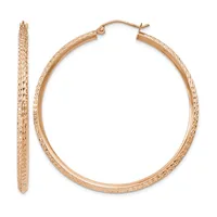 A pair of rose gold textured hoop earrings displayed flat and standing upright, showing the detailed surface pattern and hinged closure.