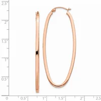 A pair of rose gold oval hoop earrings with a polished finish, shown from the front and side view against a measurement scale.