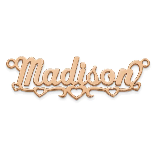 Rose gold-toned metal nameplate pendant with script lettering and decorative heart cutouts along the bottom edge, featuring attachment loops on each end.