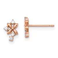 A pair of rose gold stud earrings featuring four-petaled flower designs with round diamonds set at the center and tips, with an additional diamond drop below each flower.