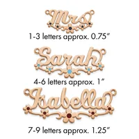 Three rose gold decorative name pendants with ornamental flourishes and gemstone accents, labeled by letter count and approximate size.