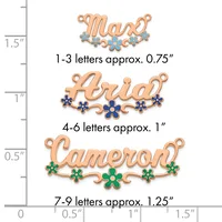 Three copper name charms with decorative flowers in different sizes, displayed against a ruler showing dimensions from 0 to 1.5 inches.