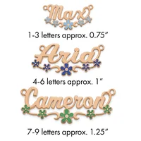 Three rose gold pendants with decorative flowers and hanging loops, labeled by letter count and approximate size: Max at 0.75 inches, Ariana at 1 inch, and Cameron at 1.25 inches.