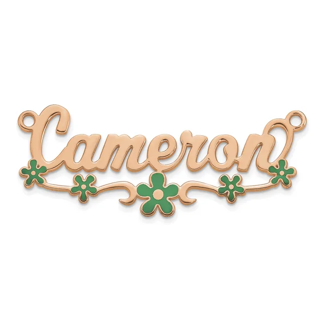 A rose gold ornament pendant with the name Cameron in script lettering, decorated with green enamel flowers along the bottom and small loops at each end for hanging.