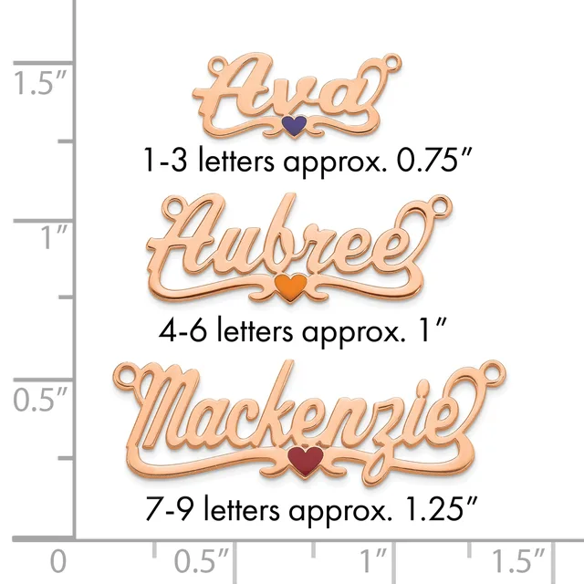 Three rose gold name charms with small heart accents shown against a ruler, ranging from approximately 0.75 to 1.25 inches in width.